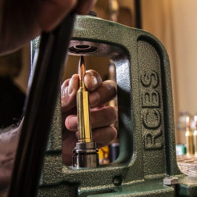 bullet being loading into a case using an RCBS reloader