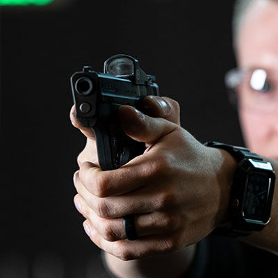 shooter aiming a handgun
