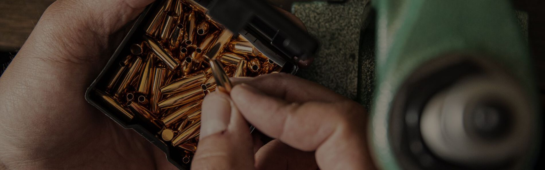 Person holding a box of bullet