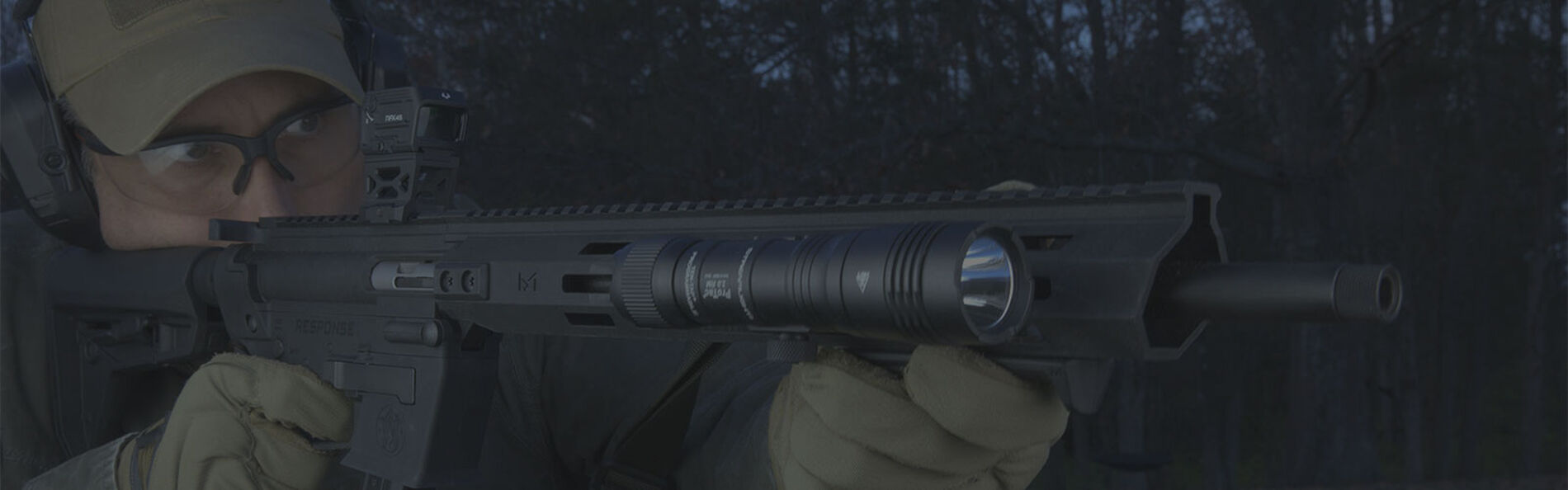 shooter aiming a rifle
