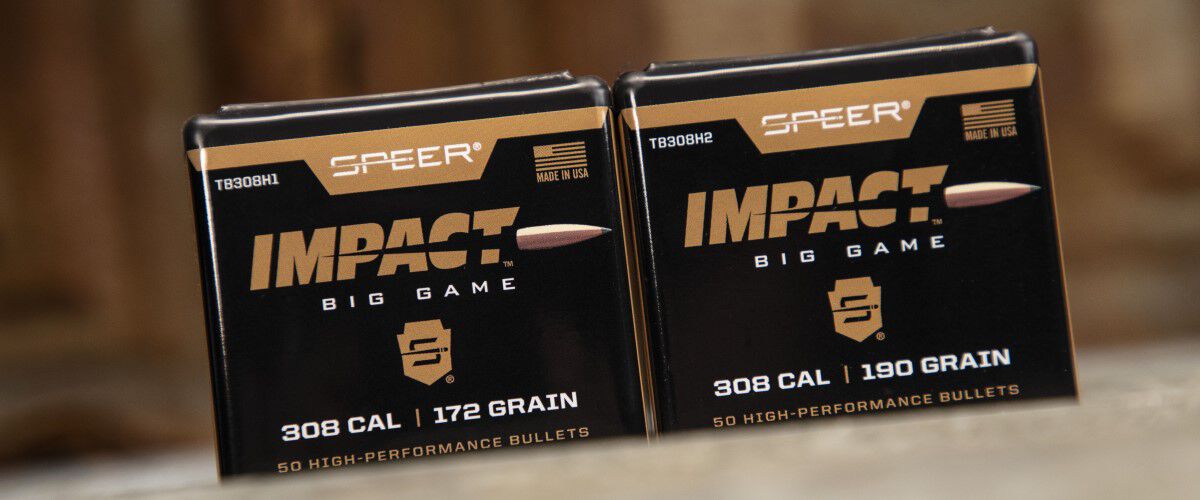 two Impact bullet packing sitting on a table