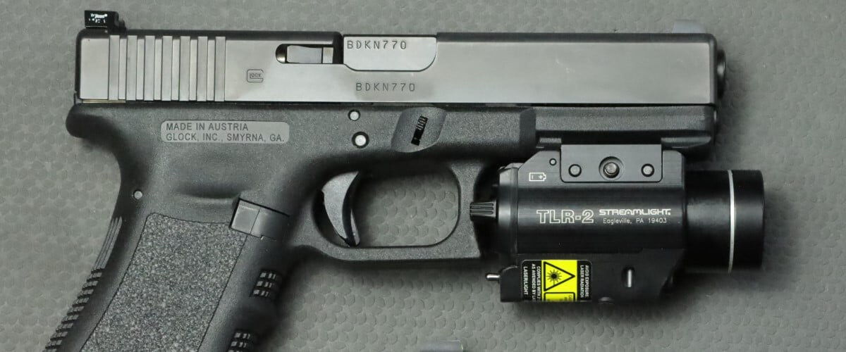 handgun with flashlight attachement