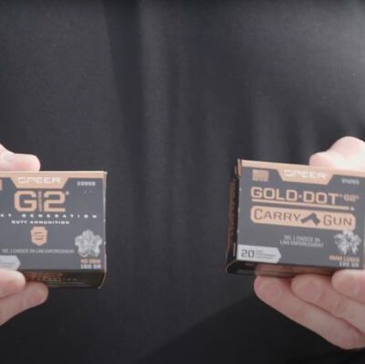 Patrick Kelley holding G2 and Carry Gun Packages