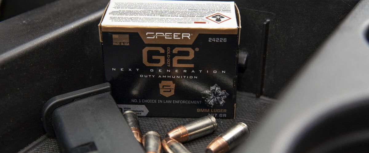Speer Gold Dot G2 box with cartiridges and a pistol magazine