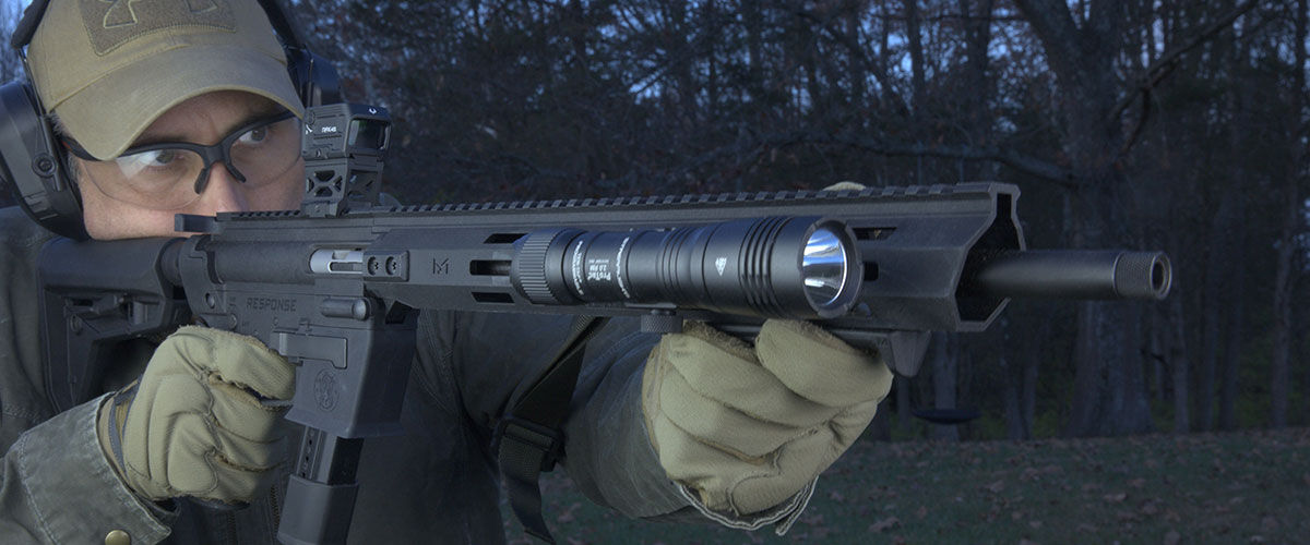 shooter aiming a rifle