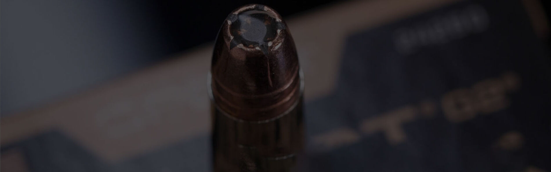 Speer Gold Dot cartridge on a Gold Dot box