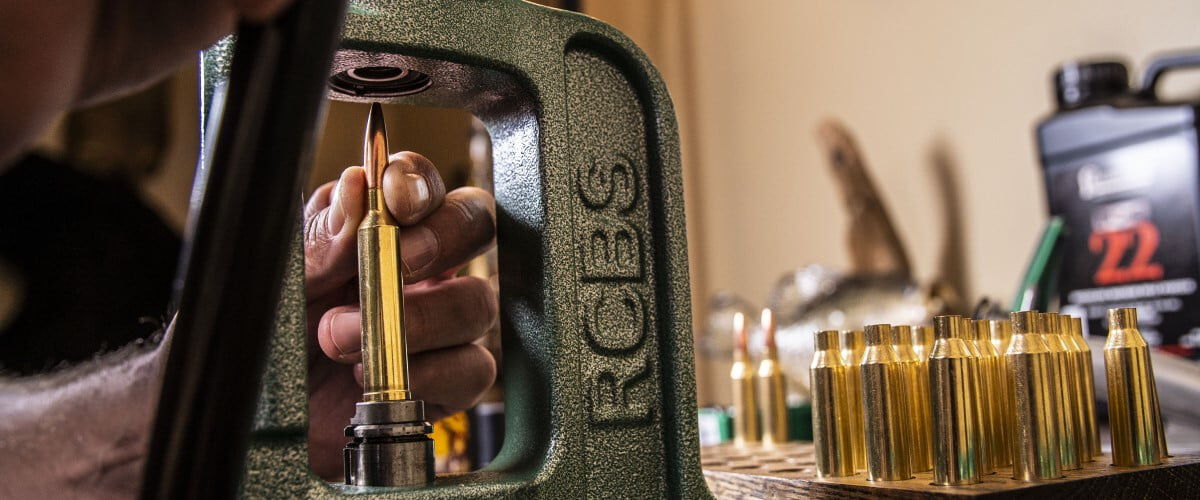bullet being loading into a case using an RCBS reloader