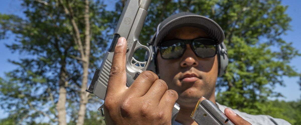 pistol being loaded