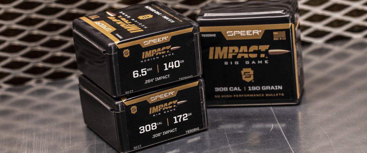 Speer Impact ammo packaing stacked on a table