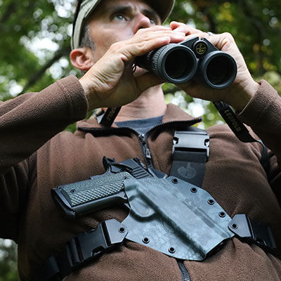 Handgun holster on a shooters chest