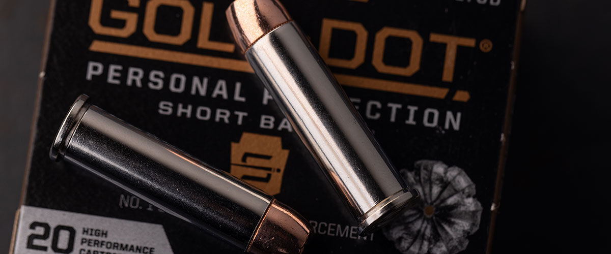 Gold Dot Short Barrel Personal Protection 357 Magnum box with cartridges on top