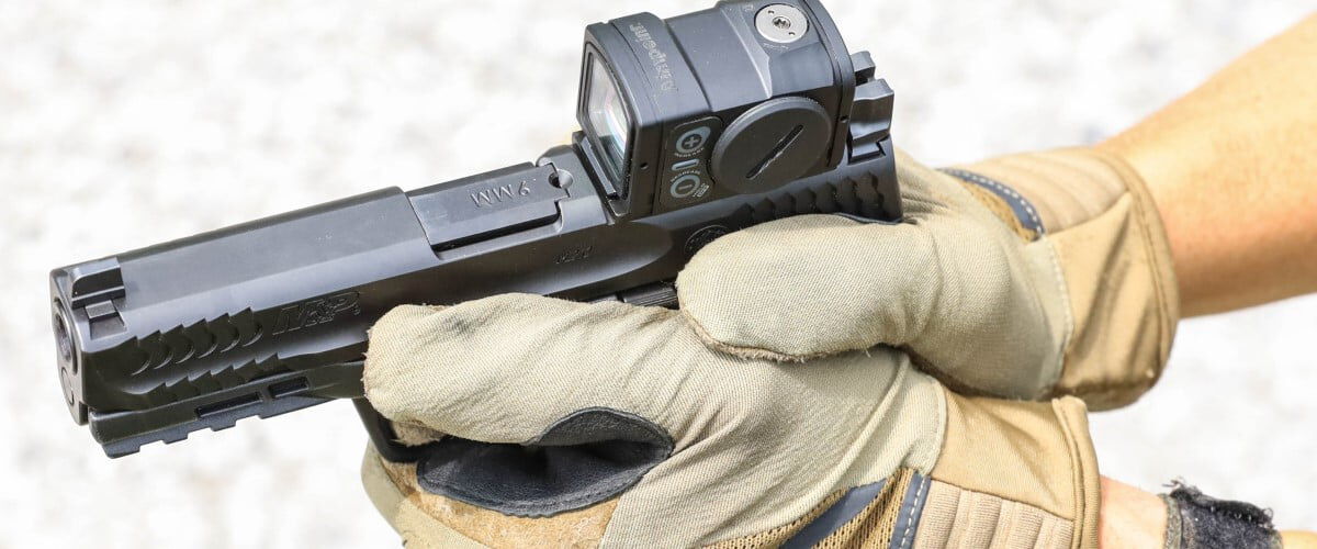 pistol with a red dot sight attached
