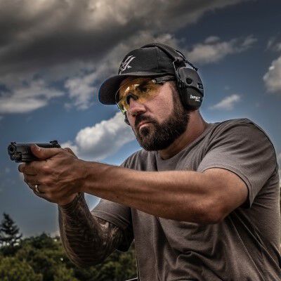 josh froelich shooting a handgun outside