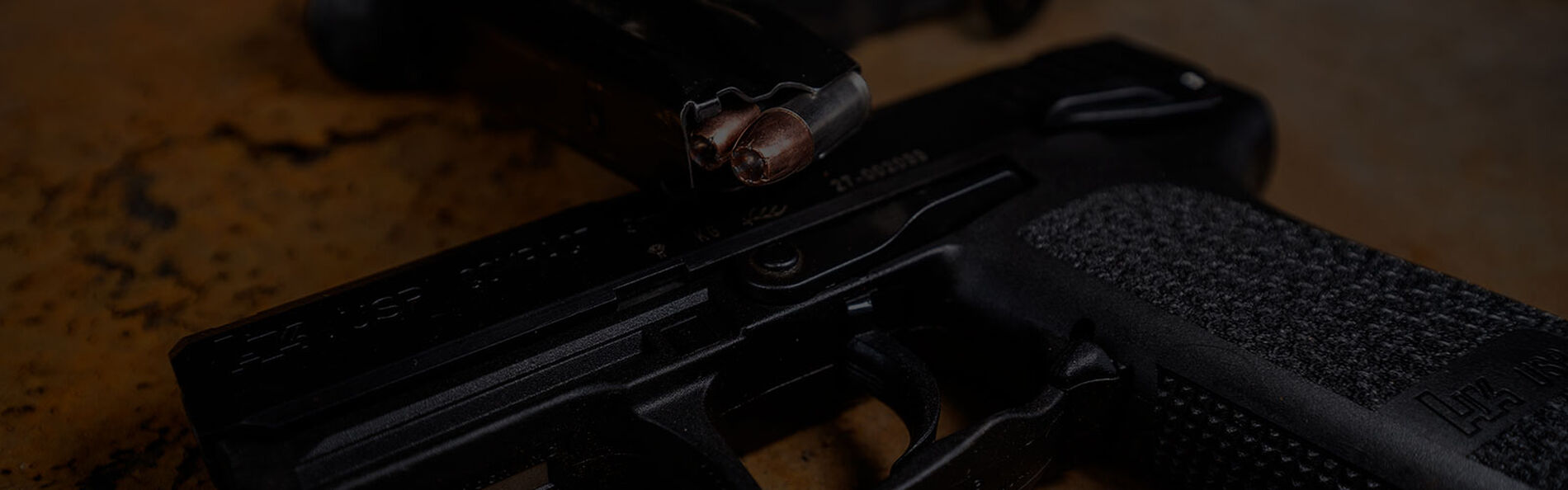 Gold Dot Personal Protection 9mm ammo being removed from container on a table