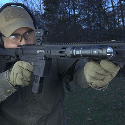shooter aiming a rifle