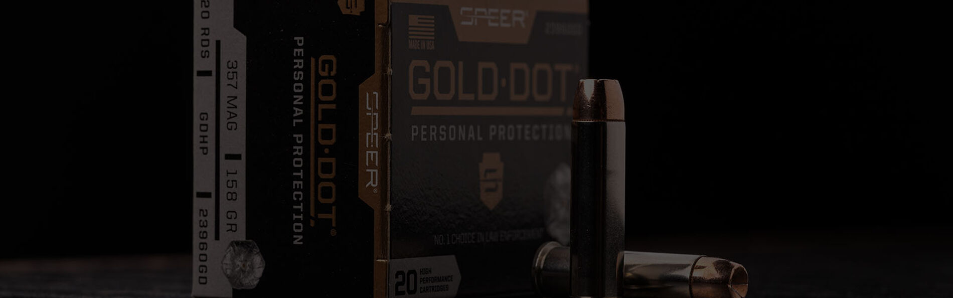Gold Dot Short Barrel Personal Protection 357 Magnum box and cartridges on a table